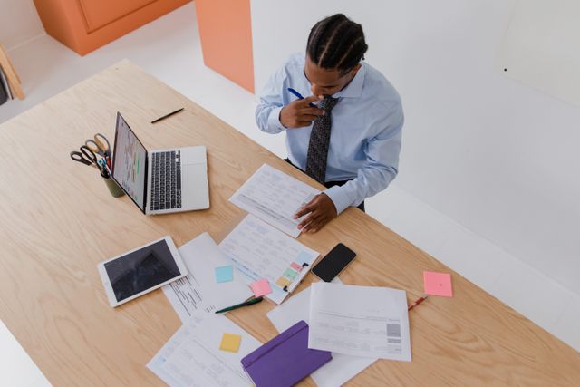Photo by RDNE Stock project: https://www.pexels.com/photo/businessman-working-on-papers-in-the-office-10376258/