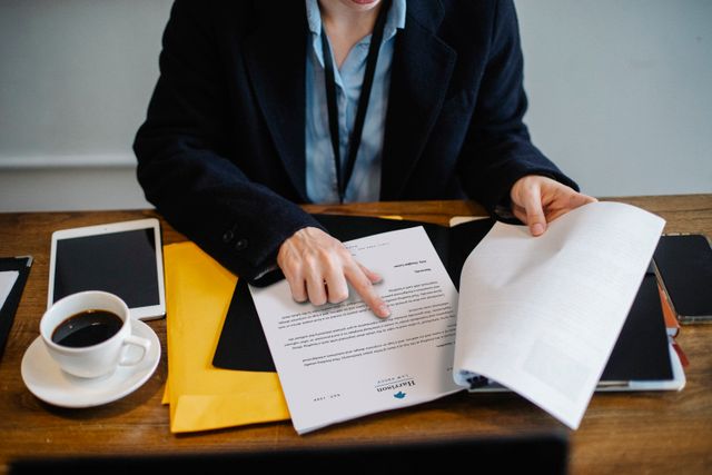 Photo by Sora Shimazaki: https://www.pexels.com/photo/crop-businesswoman-working-with-documents-in-office-5668494/