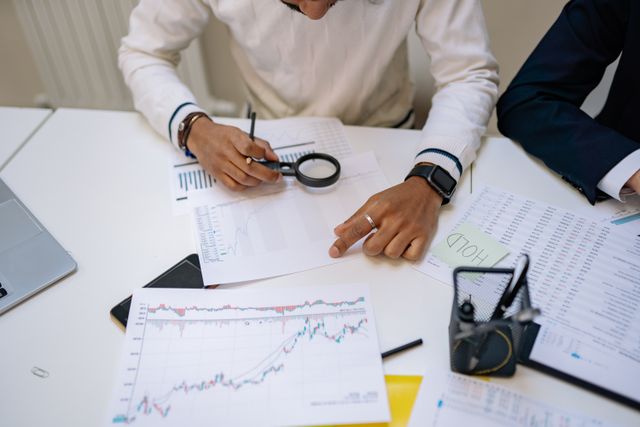Photo by Yan Krukau: https://www.pexels.com/photo/man-sitting-with-magnifying-glass-over-papers-7693722/
